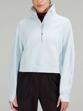 Lululemon women’s scuba funnel neck half zip.